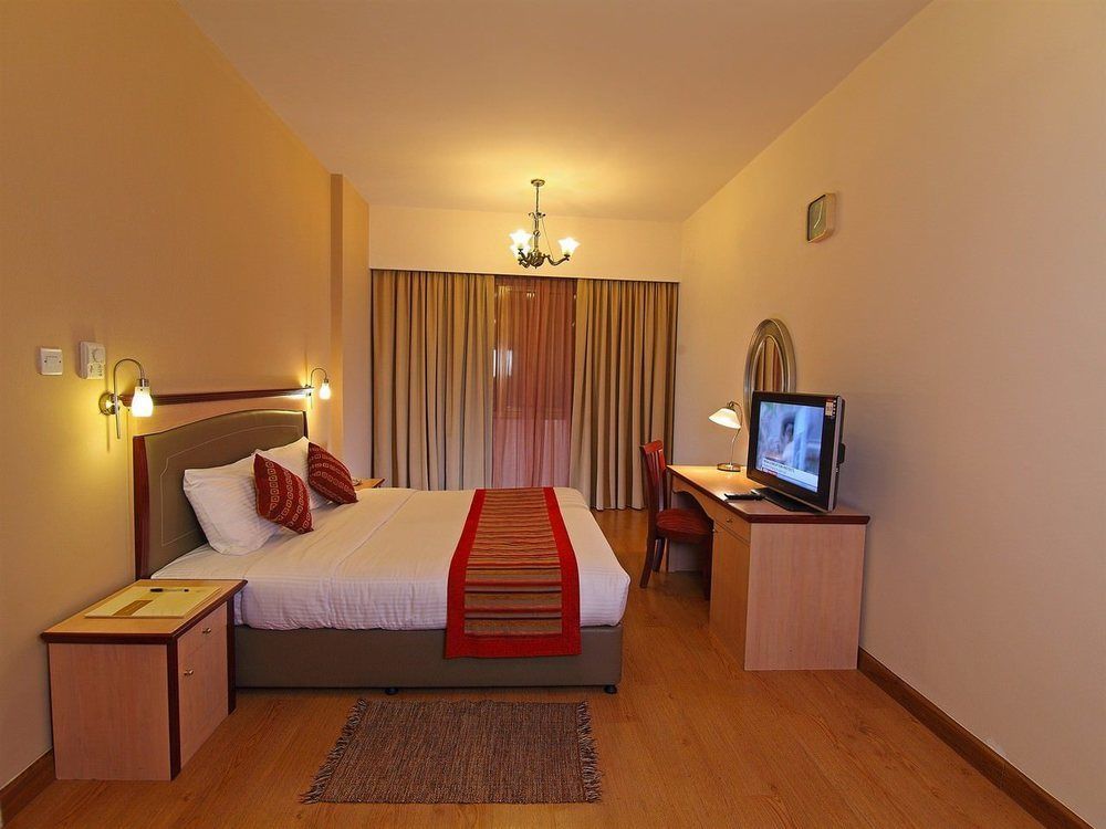 Florida City Hotel Apartments Дубай Екстериор снимка