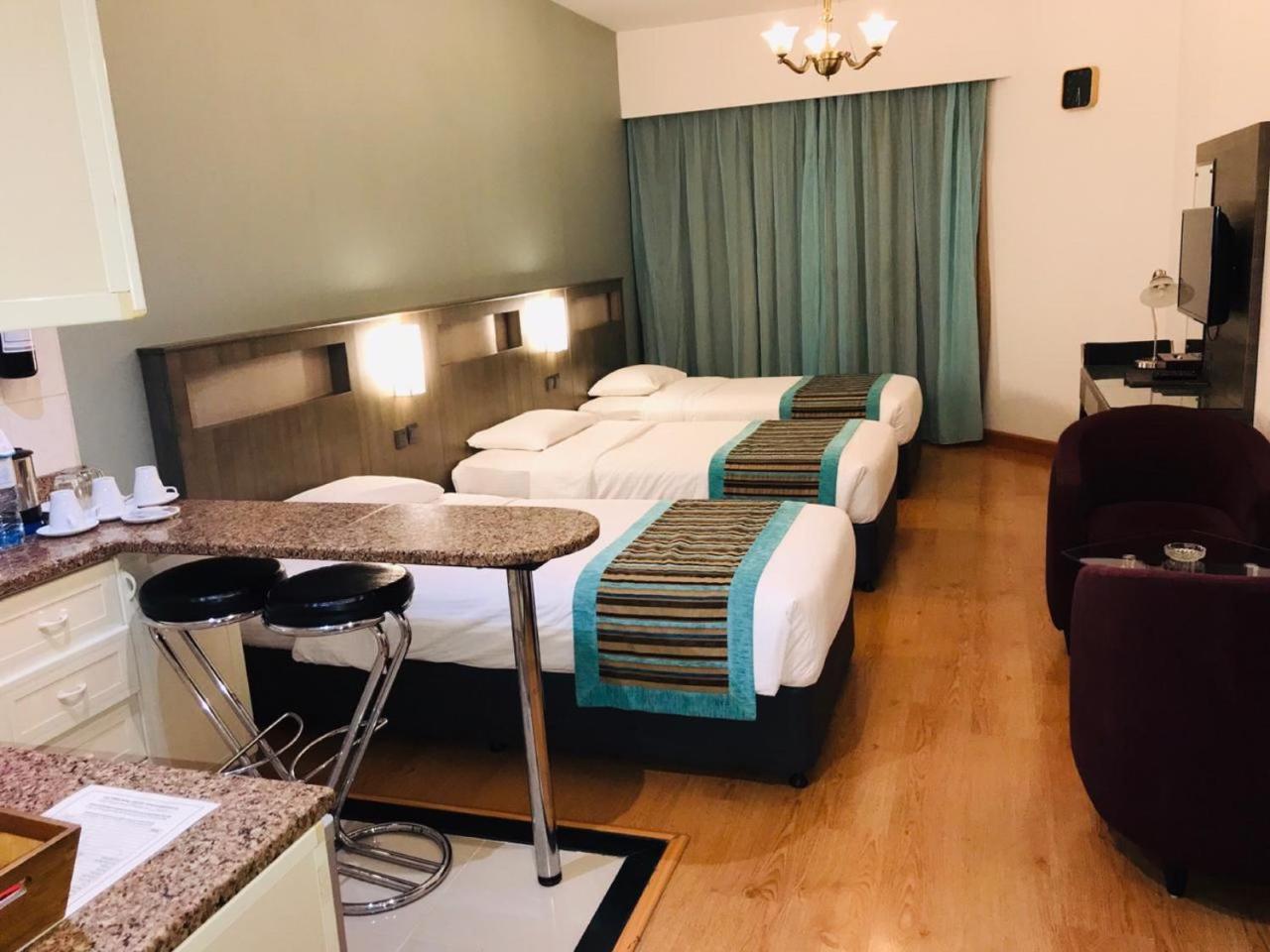 Florida City Hotel Apartments Дубай Екстериор снимка