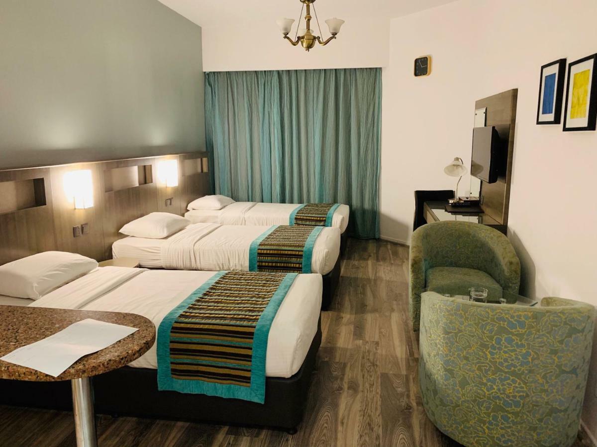 Florida City Hotel Apartments Дубай Екстериор снимка