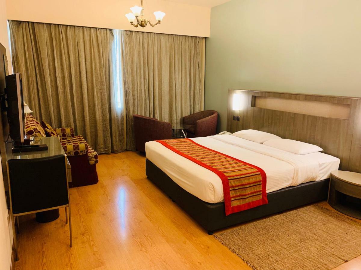 Florida City Hotel Apartments Дубай Екстериор снимка